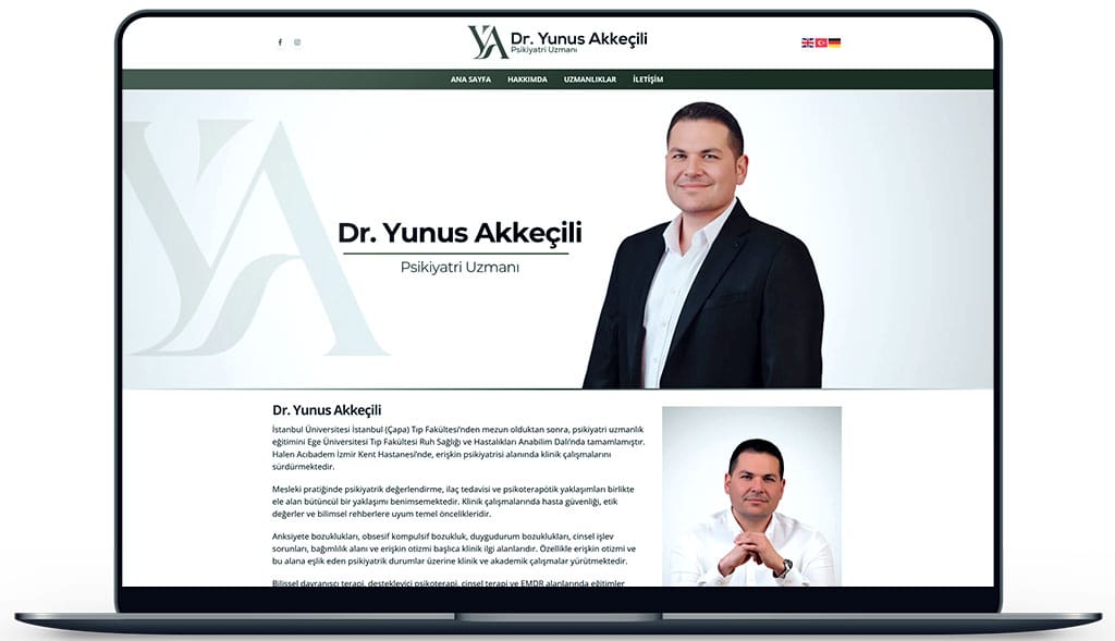 Screenshot of a psychiatrist's professional website homepage on a laptop screen, showing a smiling doctor in a dark suit beside the site logo and navigation bar.